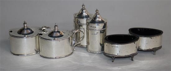 A George V silver six piece condiment set.